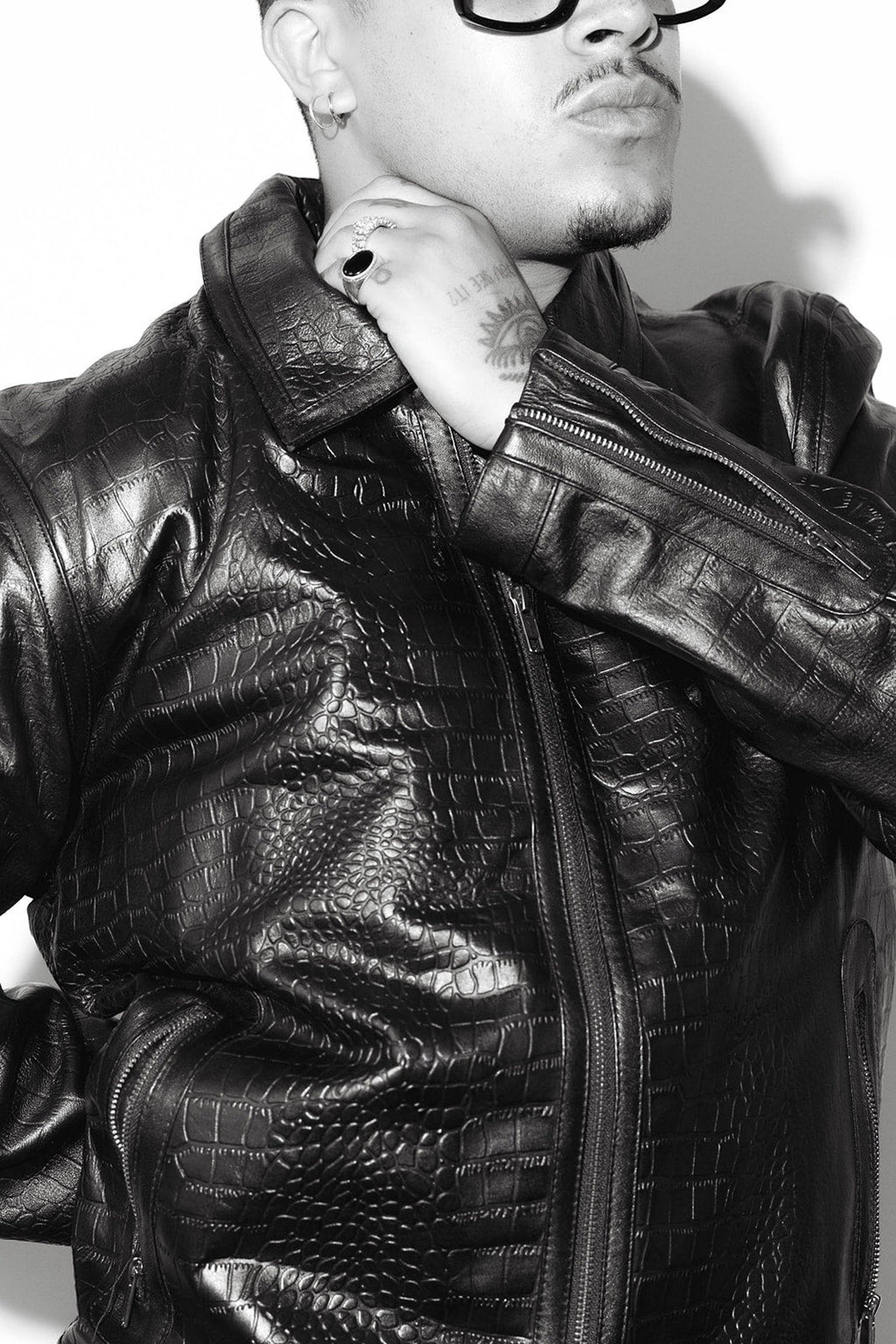 David Dangelo Caldwell black embossed crocodile cowhide leather jacket with a sleek silhouette and zipper details.