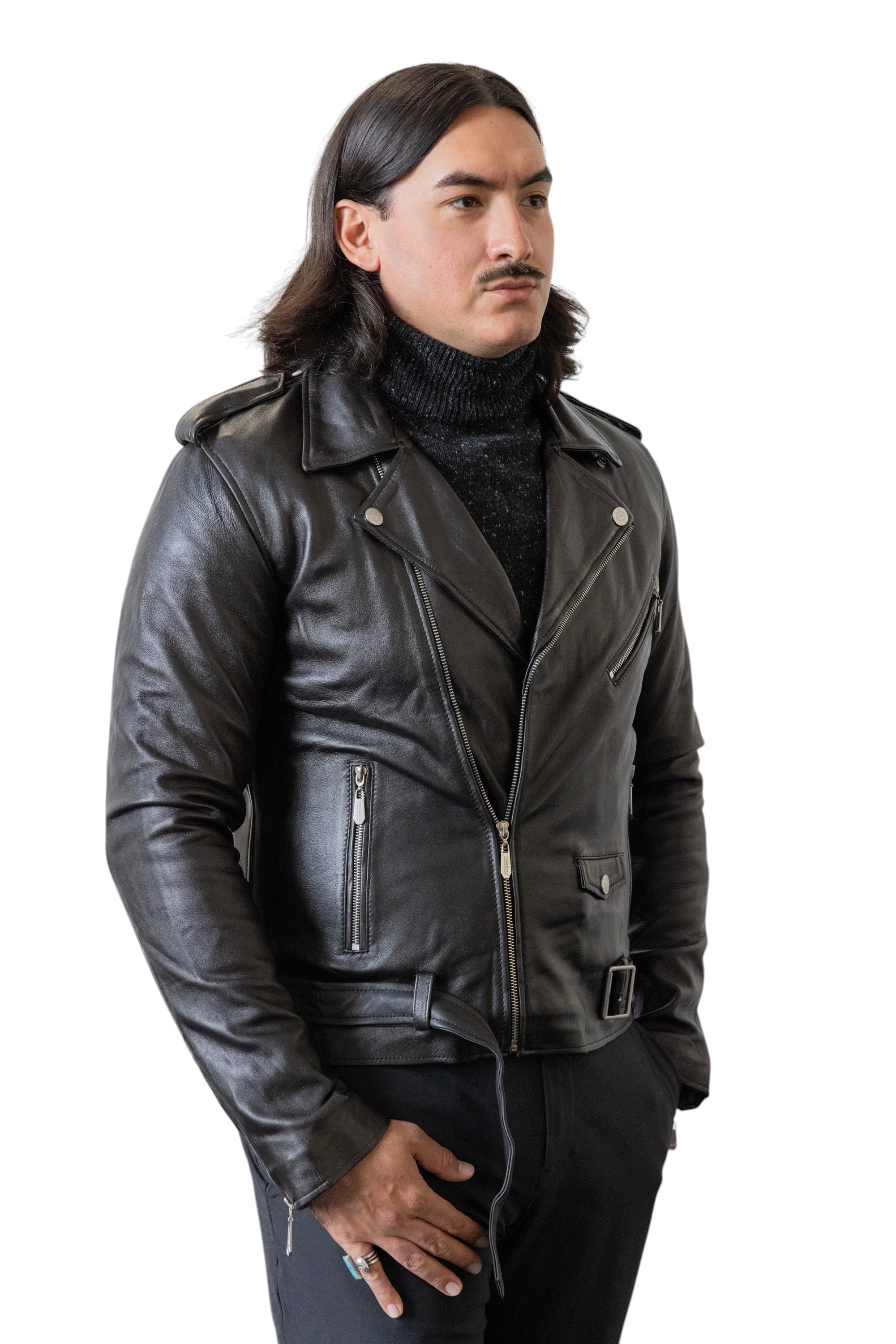 David Dangelo Caldwell black nappa lamb biker jacket with Aztec snaps and custom zipper pulls. Model wears a black turtleneck.