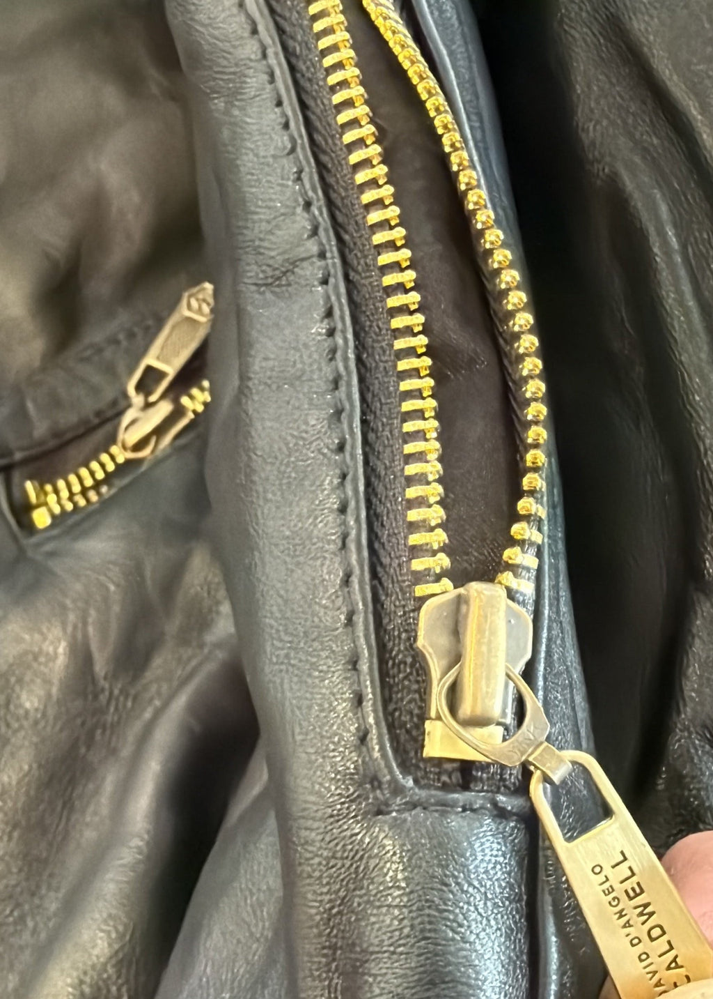 David Dangelo Caldwell black lamb leather reversible hoodie with gold zipper and pockets.