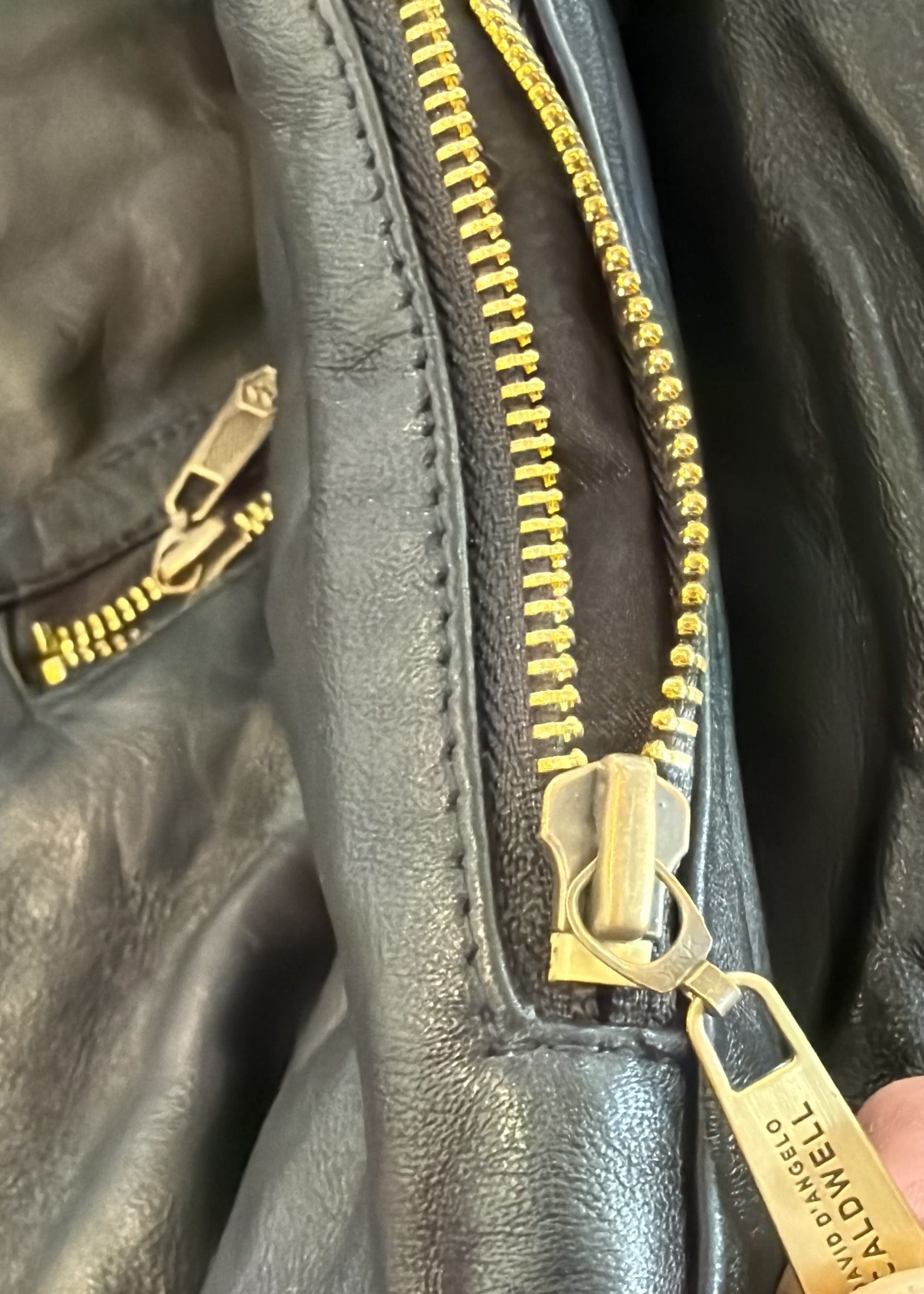 David Dangelo Caldwell black lamb leather reversible hoodie with gold zipper and pockets.