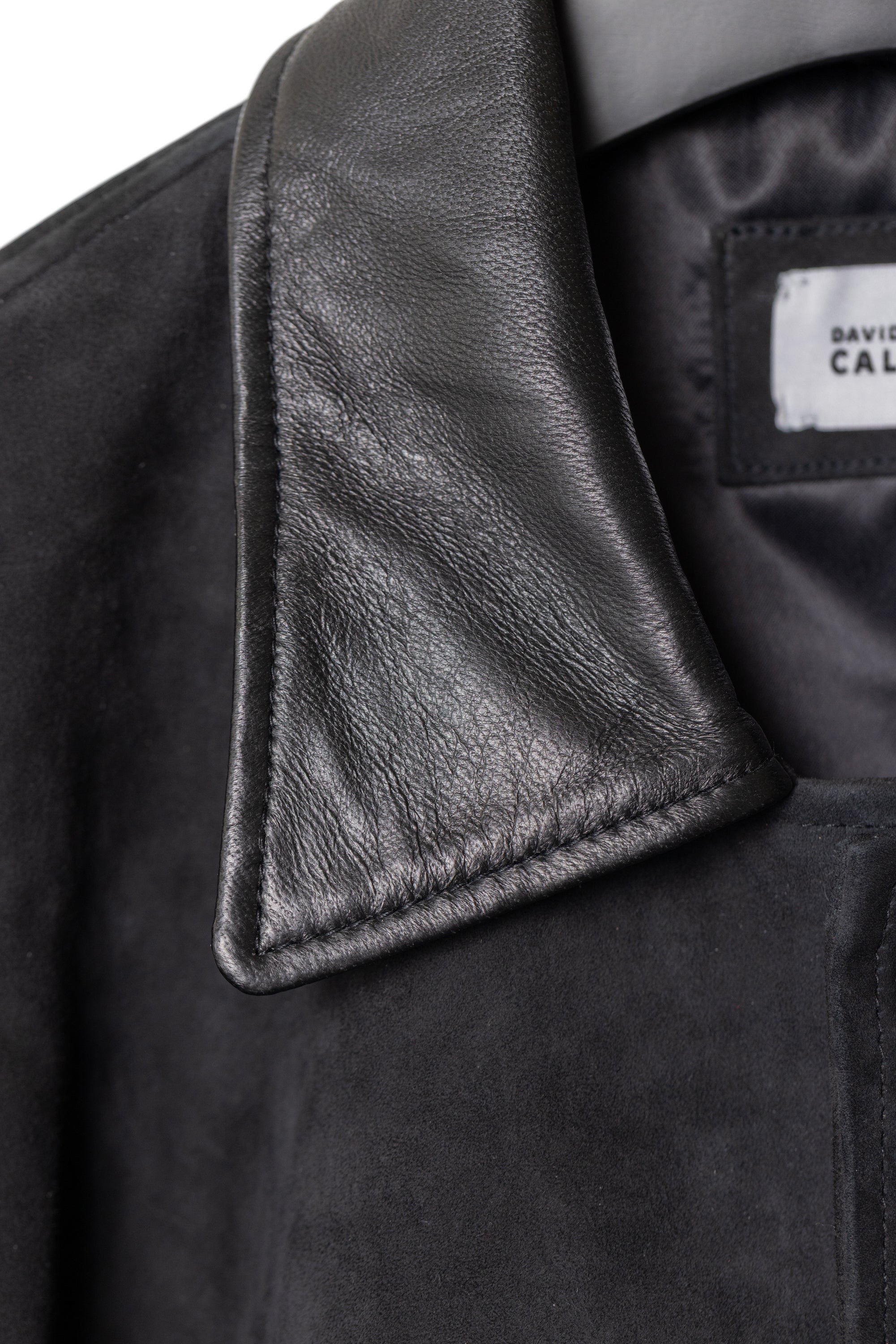 David Dangelo Caldwell black suede varsity jacket with black leather collar, sleeves, and welt pockets. Silk lining.