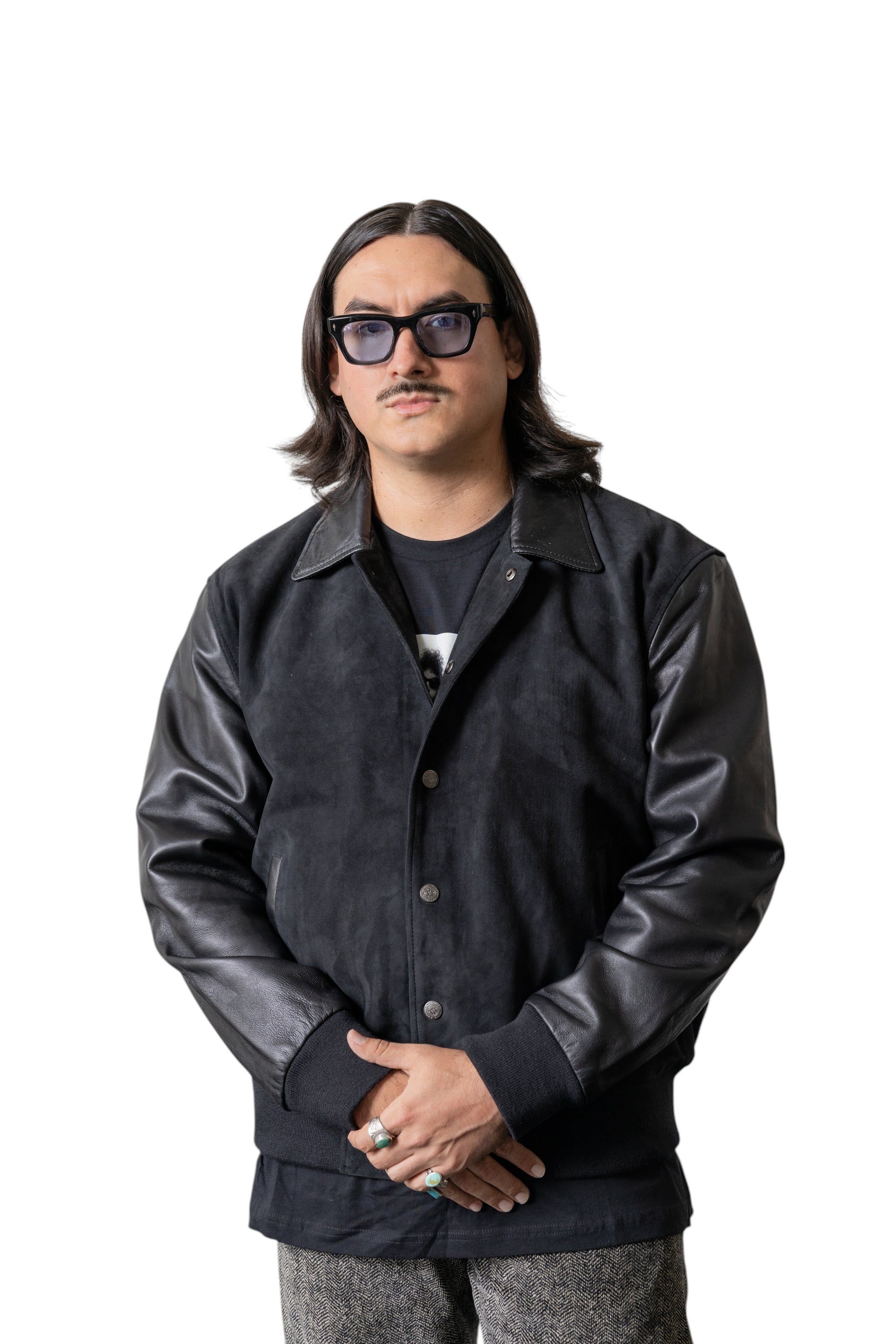 David Dangelo Caldwell black suede varsity jacket with black leather sleeves, collar, and welt pockets. Silk lining.