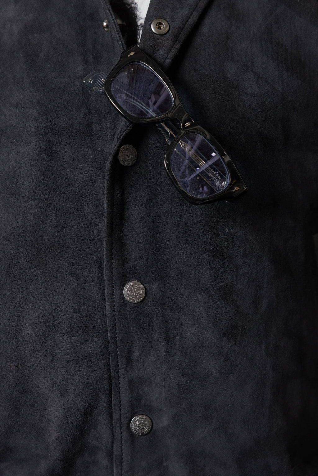 David Dangelo Caldwell black suede varsity jacket with nappa lamb skin sleeves, collar, and welt pockets. Silk lining.