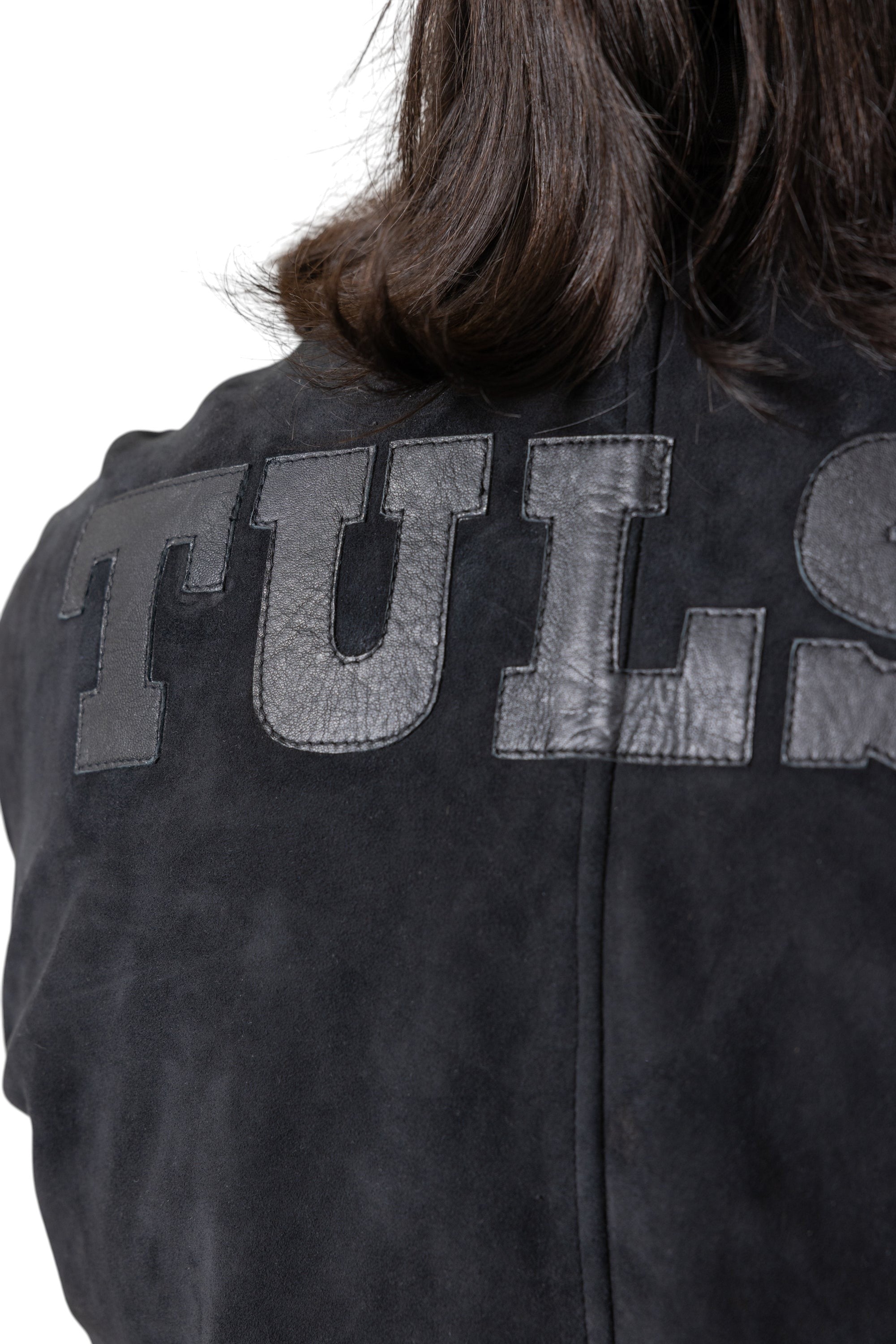 David Dangelo Caldwell black suede varsity jacket with contrasting leather "TULSA" lettering on back and silk lining.
