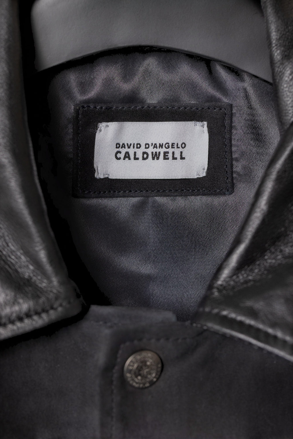 David Dangelo Caldwell black suede and nappa lamb skin varsity jacket with silk lining and customisable city name.