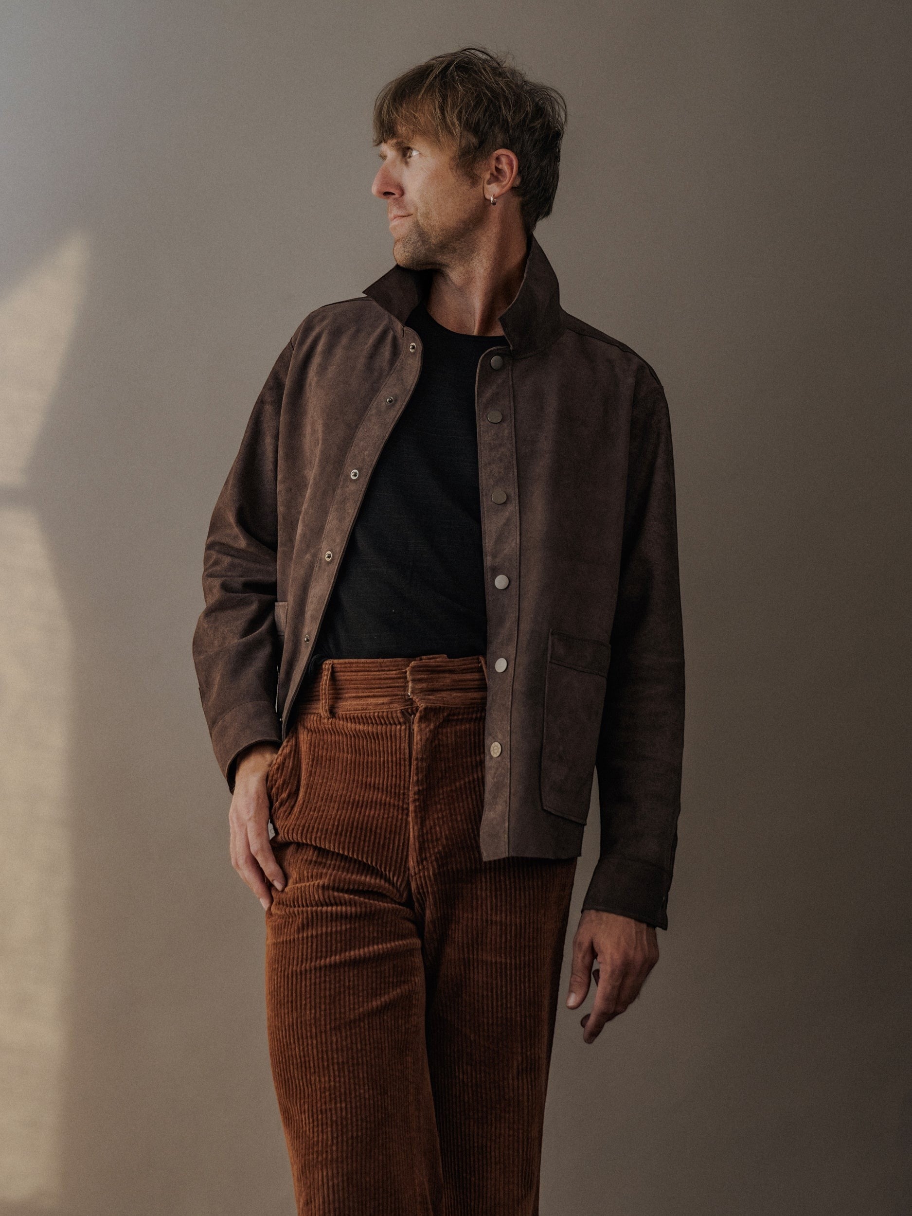 David Dangelo Caldwell brown suede leather jacket with patch pockets and custom hardware. Classic fit, made in USA.
