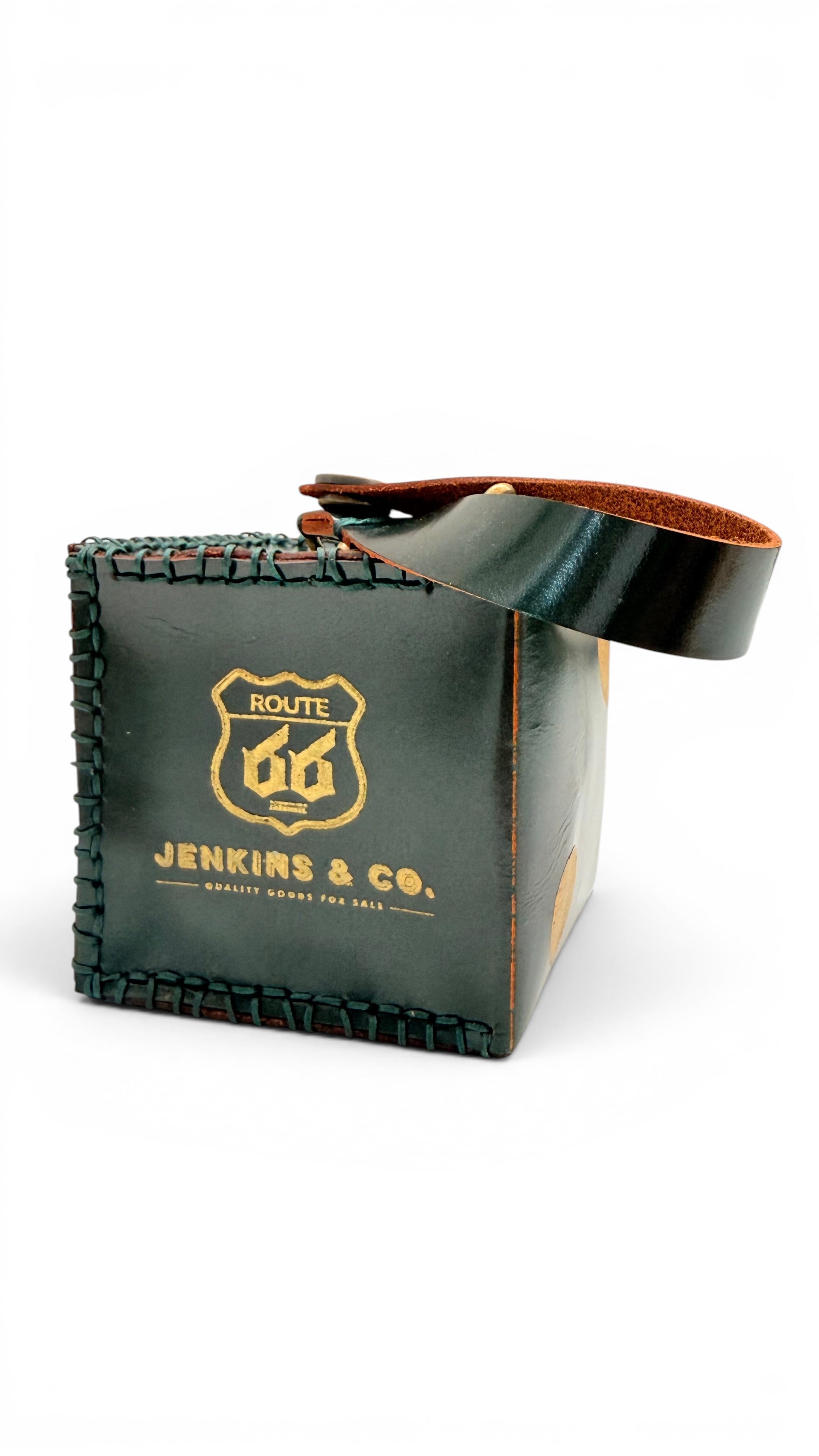 David Dangelo Caldwell dark green leather dice charm with Route 66 logo, stitched edges, and hanging strap.