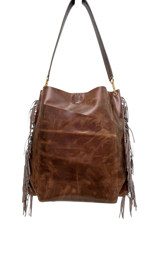 David Dangelo Caldwell brown leather fringe tote bag with exterior pockets and snap closure.