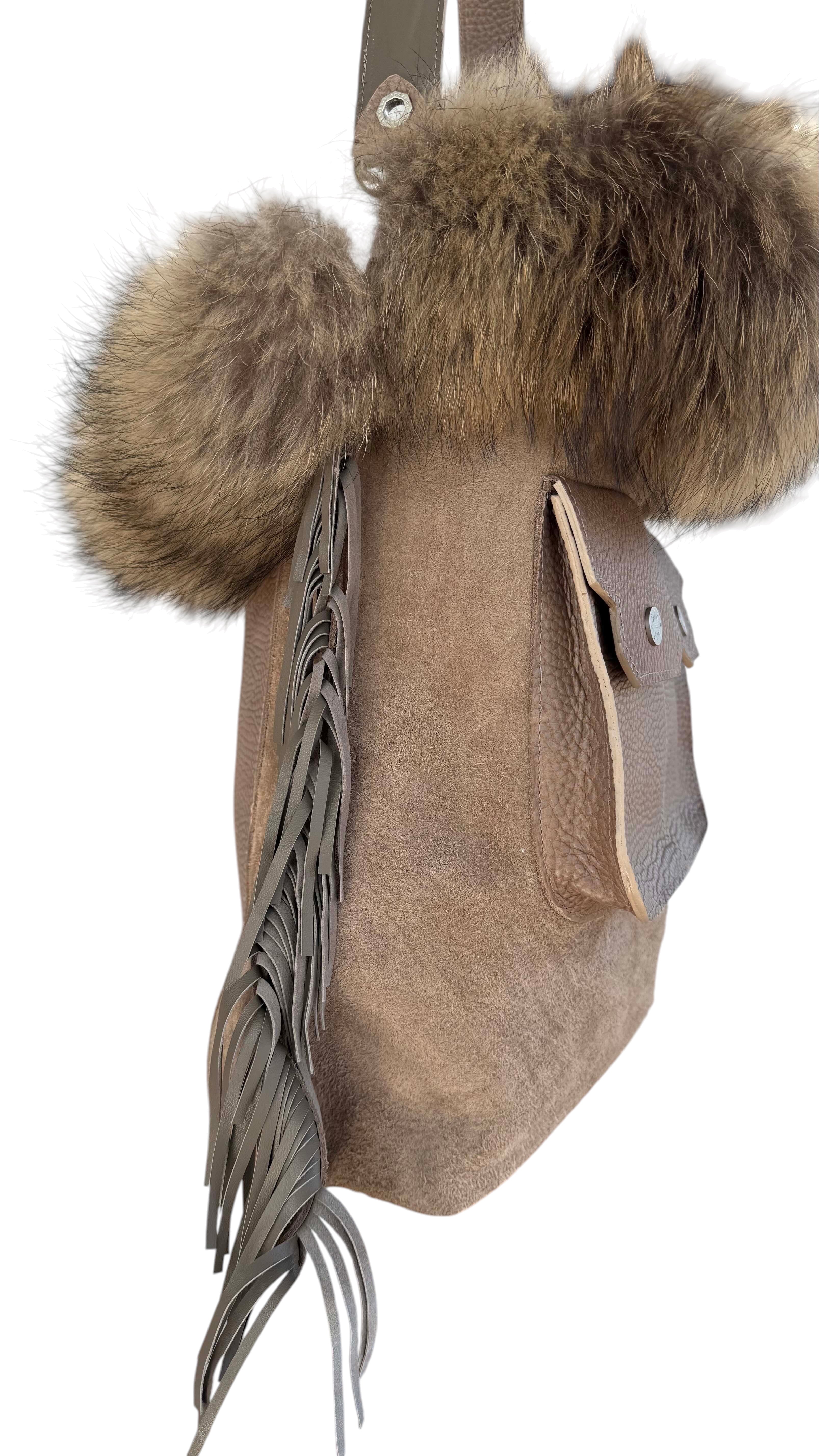 David Dangelo Caldwell brown leather tote with natural Finnish raccoon fur trim and leather fringe detail.