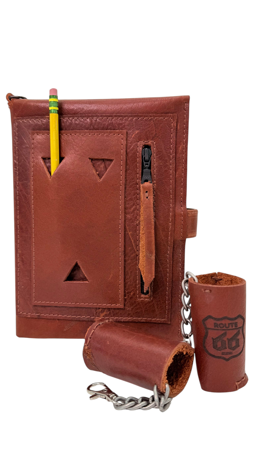 David Dangelo Caldwell brown leather journal cover with pencil slot, zipper pocket, and chain accessory. Fits A5 notebooks.