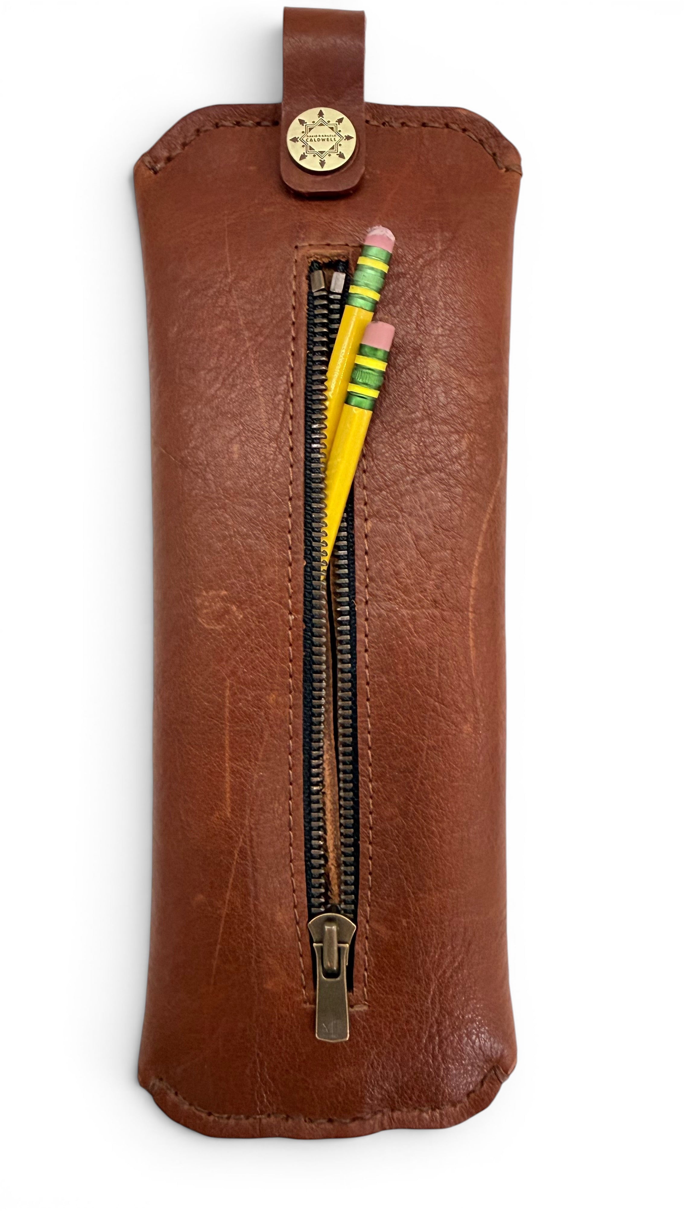 David Dangelo Caldwell brown bison leather pencil pouch with zipper closure and two yellow pencils.
