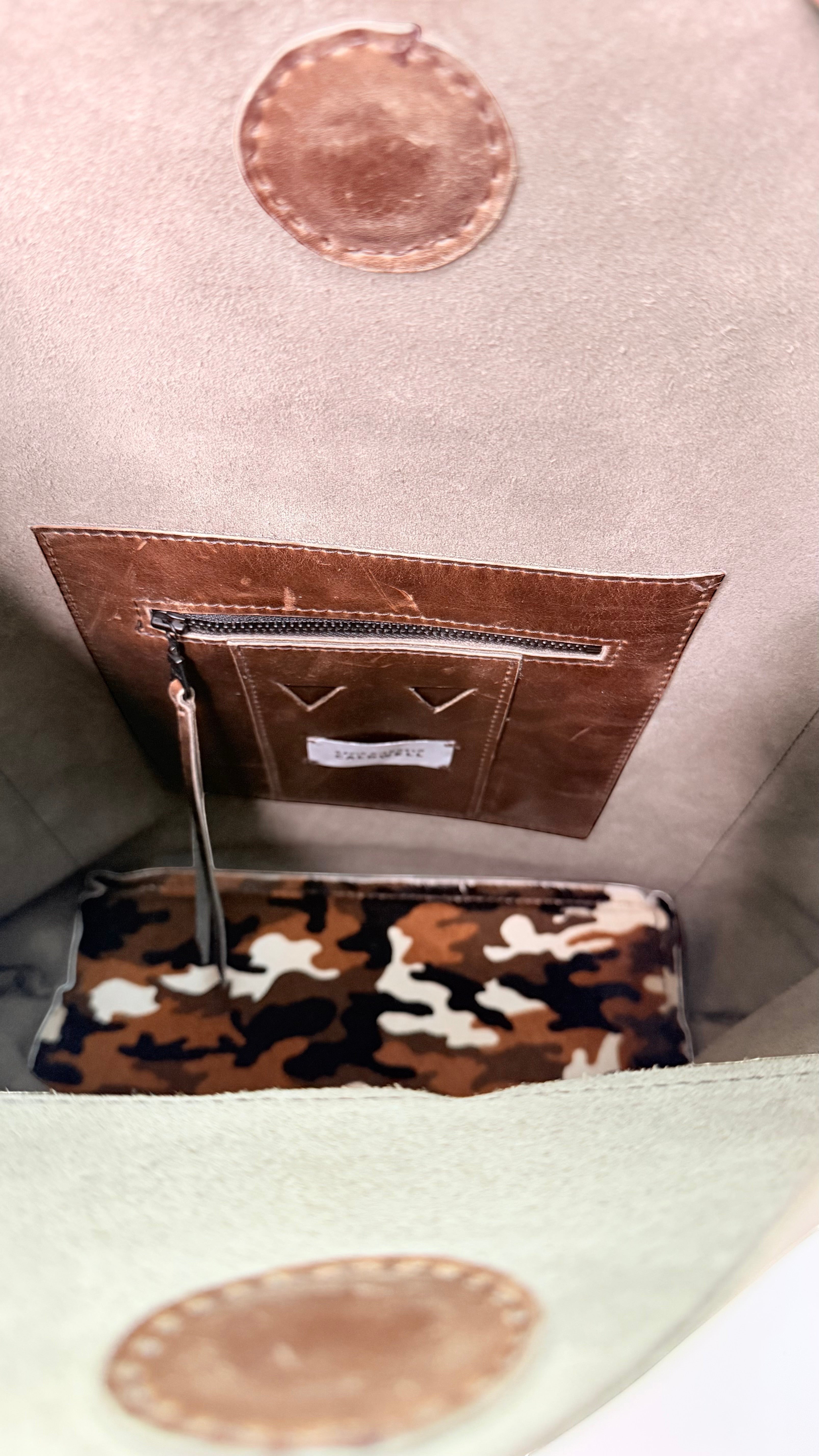 David Dangelo Caldwell tan leather tote bag interior with camouflage pouch, zipper pocket, and card slots.