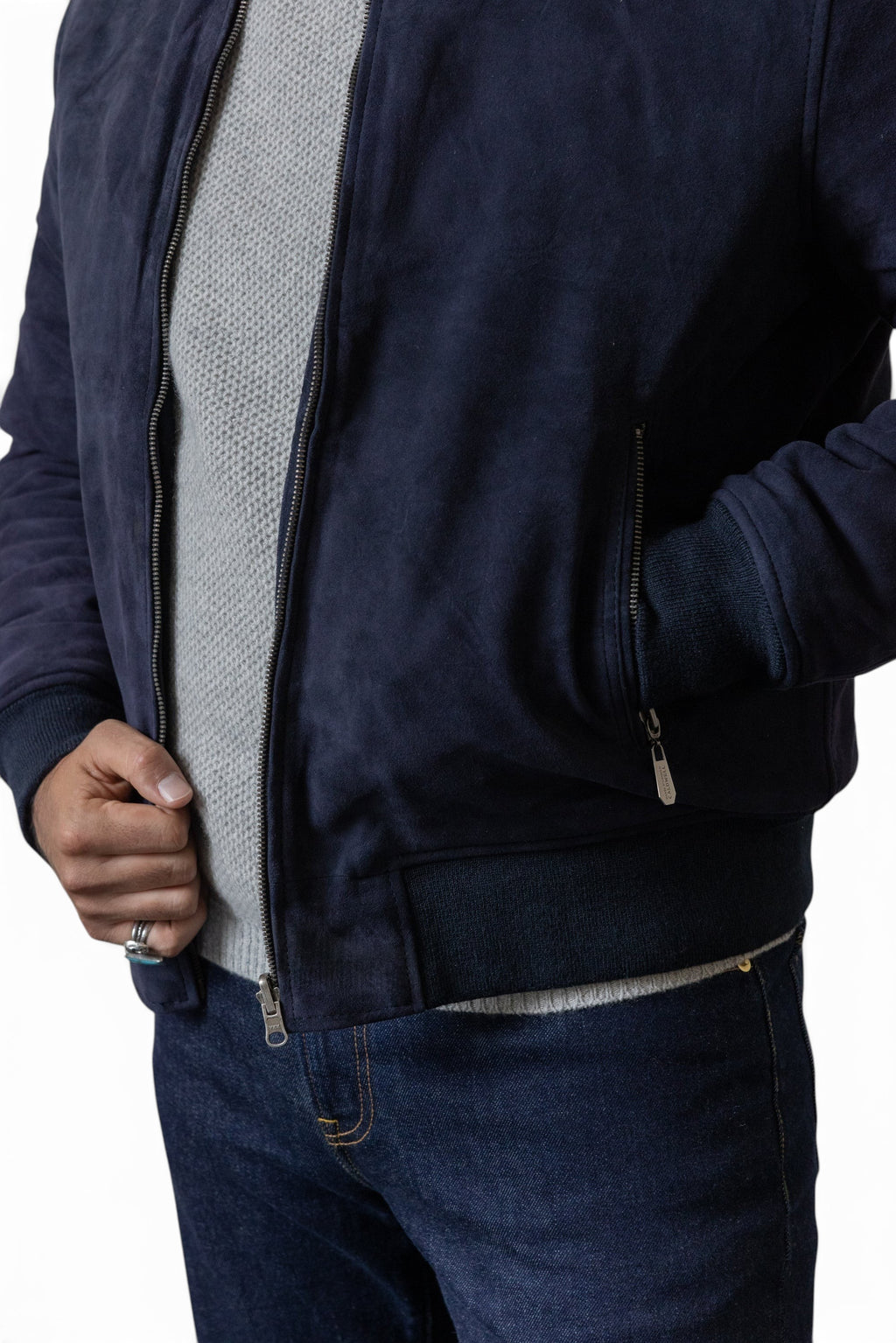 David Dangelo Caldwell navy blue suede bomber jacket with puffer lining and custom hardware.