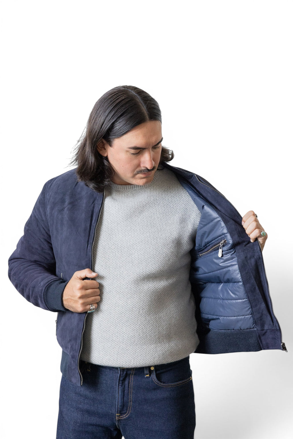 David Dangelo Caldwell navy blue reversible bomber jacket in nappa lamb suede with puffer lining and custom hardware.