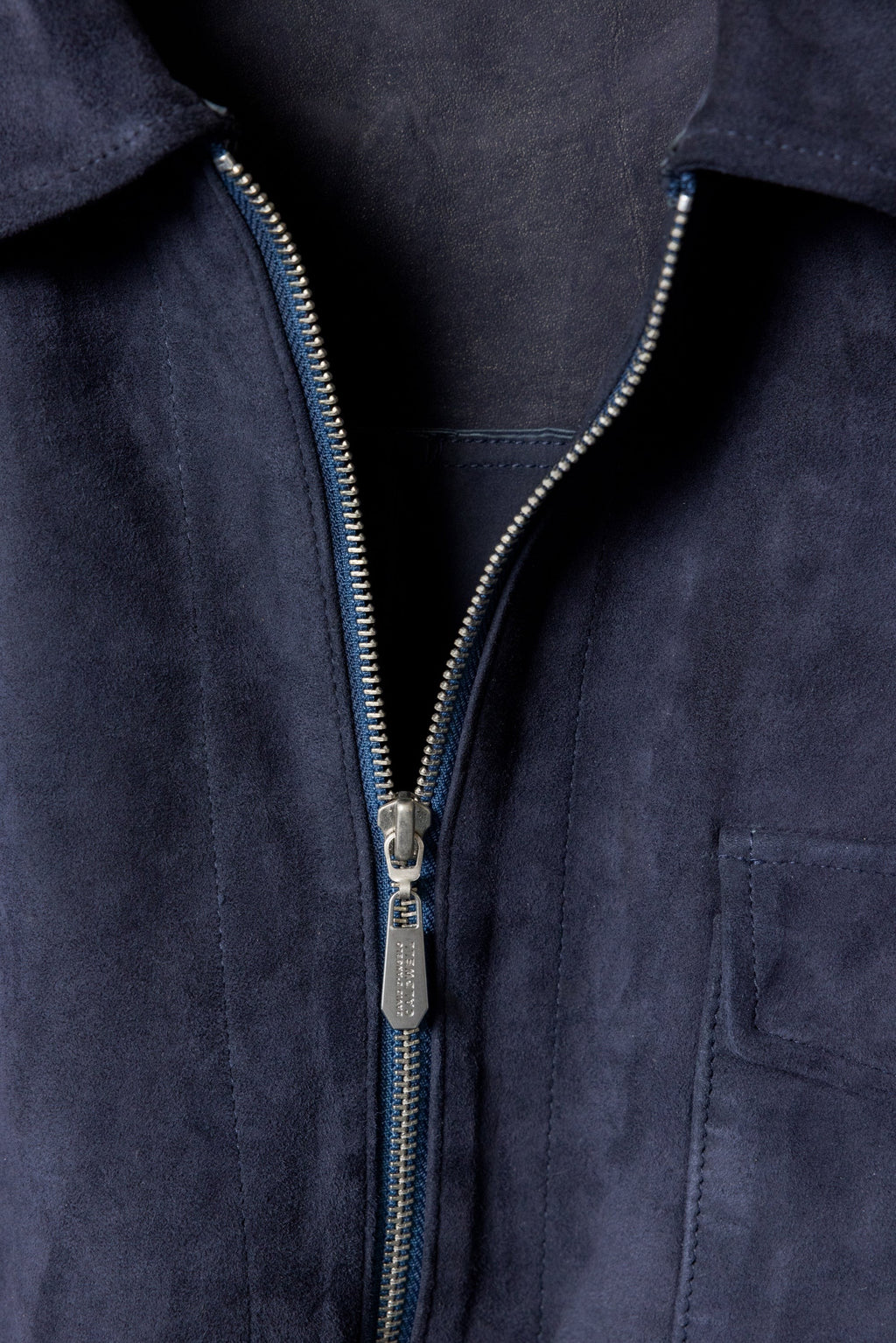 David Dangelo Caldwell navy blue suede artisan work shirt with silver zipper and chest pocket.