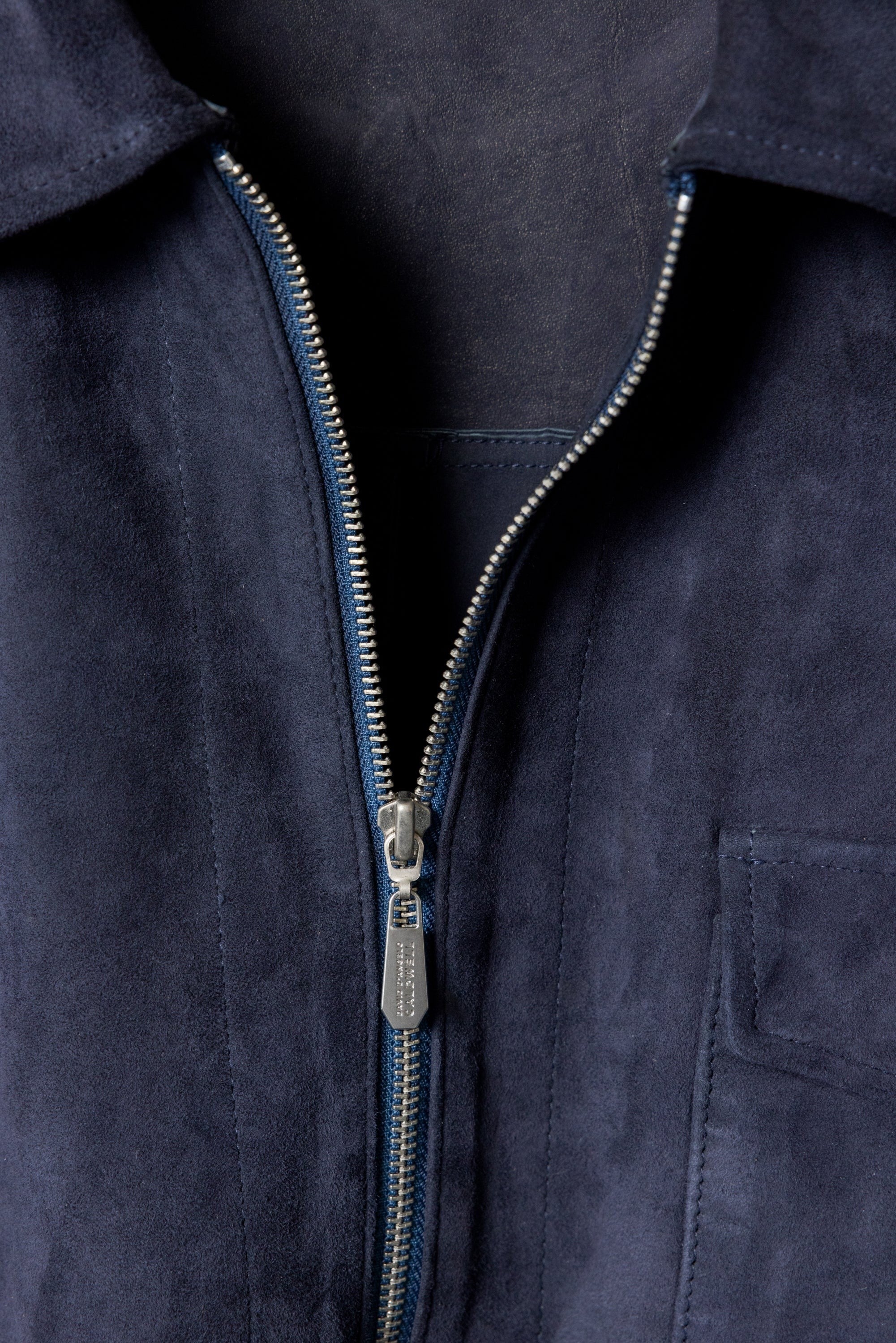 David Dangelo Caldwell navy blue suede artisan work shirt with silver zipper and chest pocket.