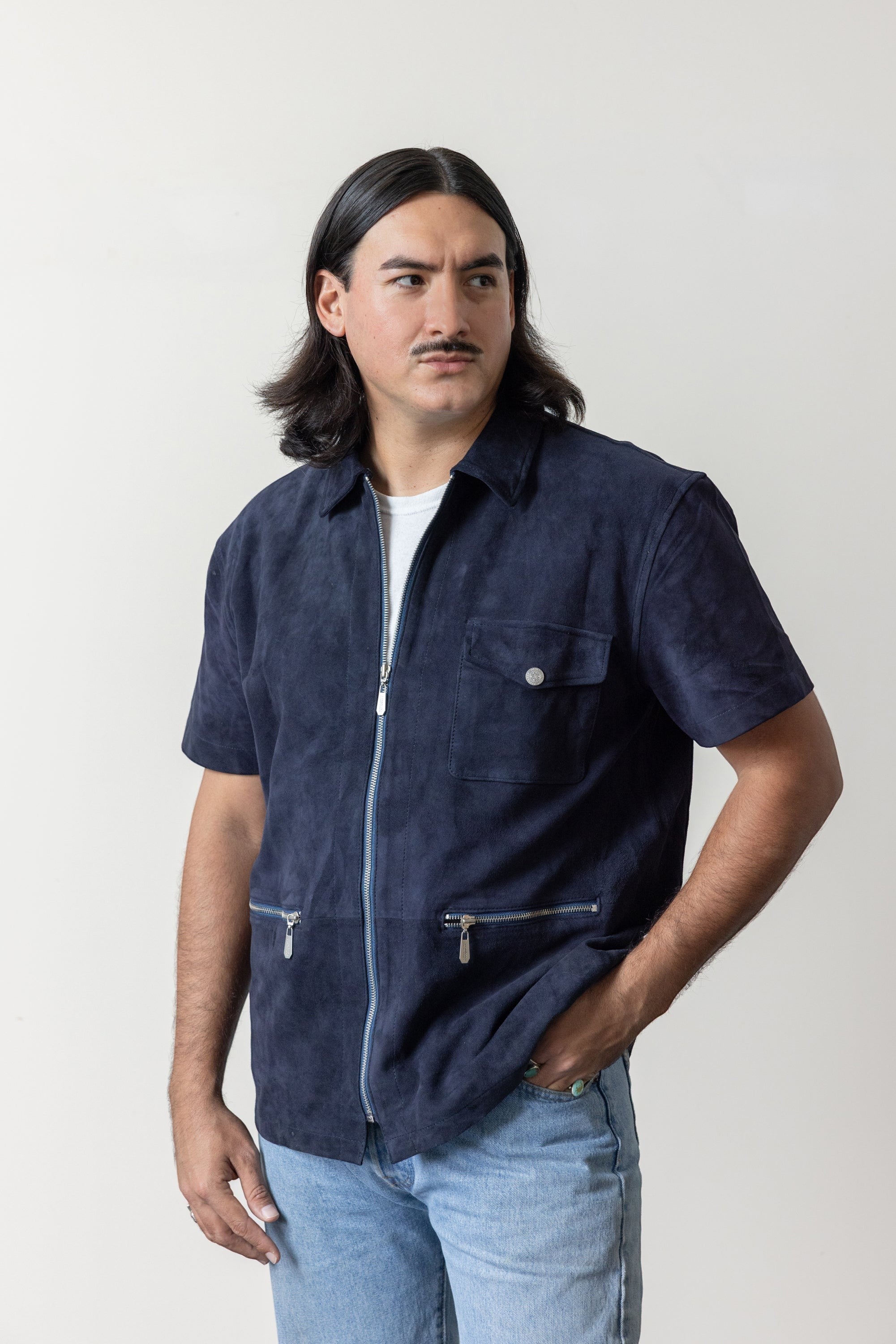 David Dangelo Caldwell navy blue suede short-sleeve zip-up work shirt with utility pockets.