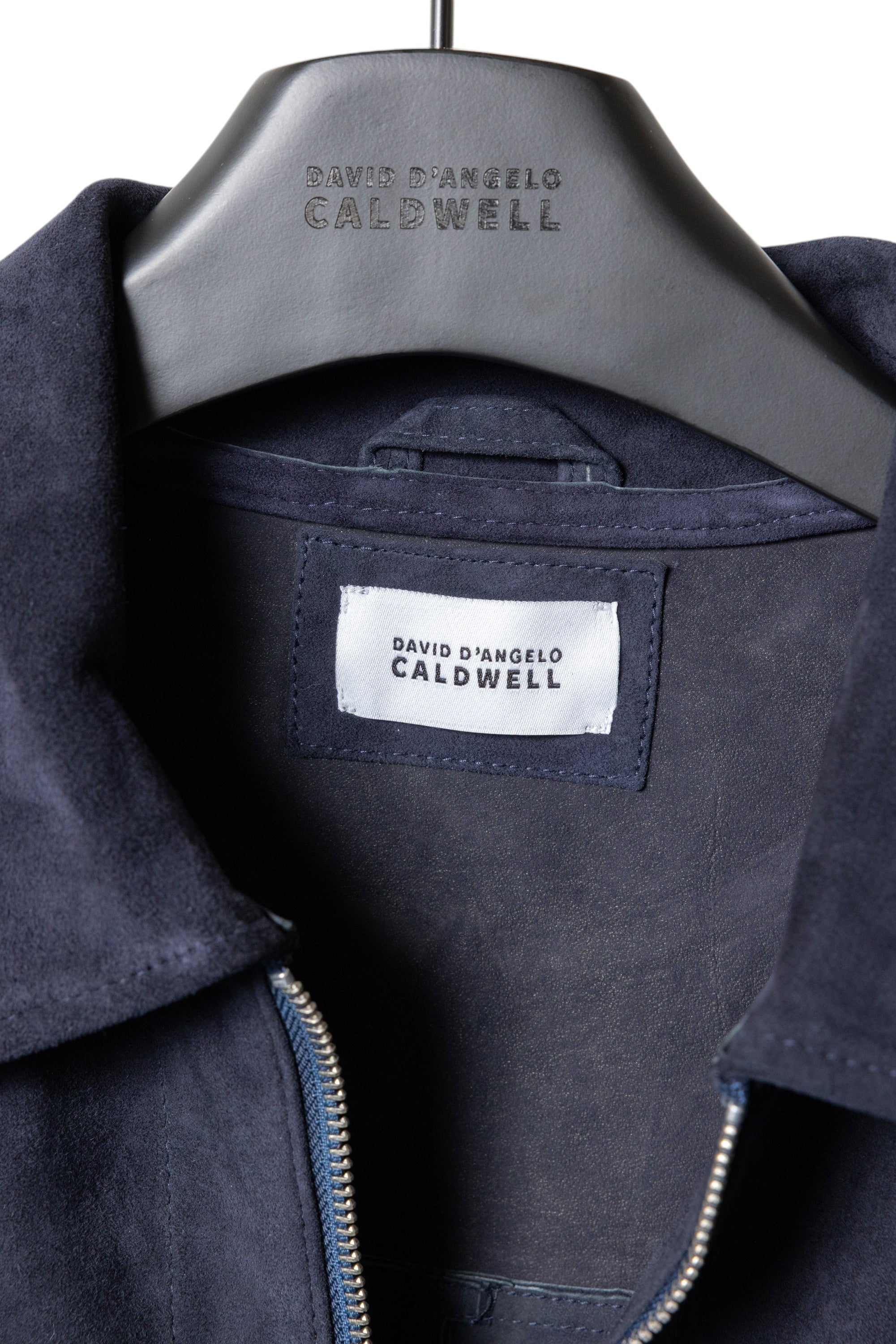 David Dangelo Caldwell navy blue suede artisan work shirt with silver zipper and utility pockets.