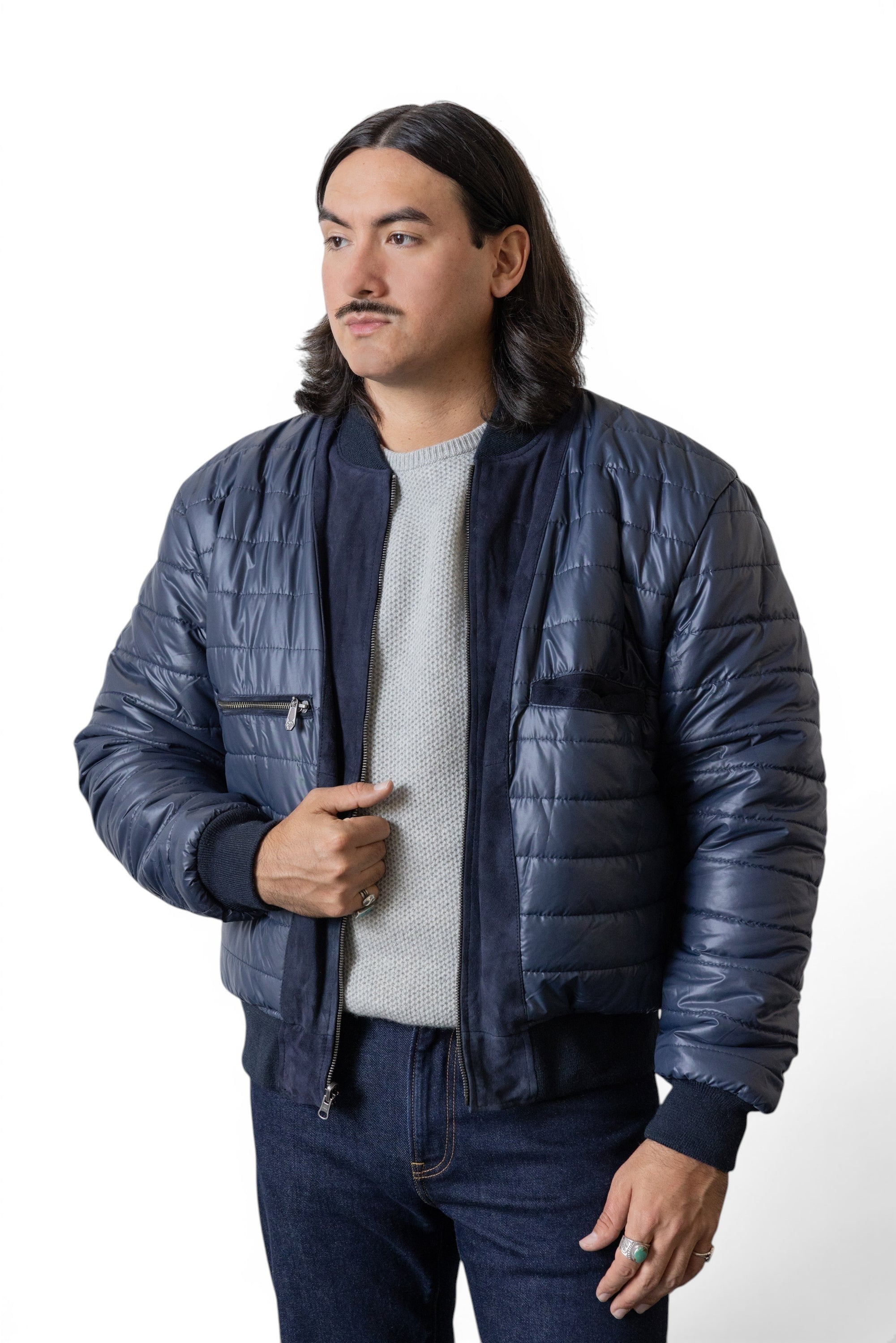 David Dangelo Caldwell navy blue reversible bomber jacket with suede accents and puffer detailing. Classic fit.