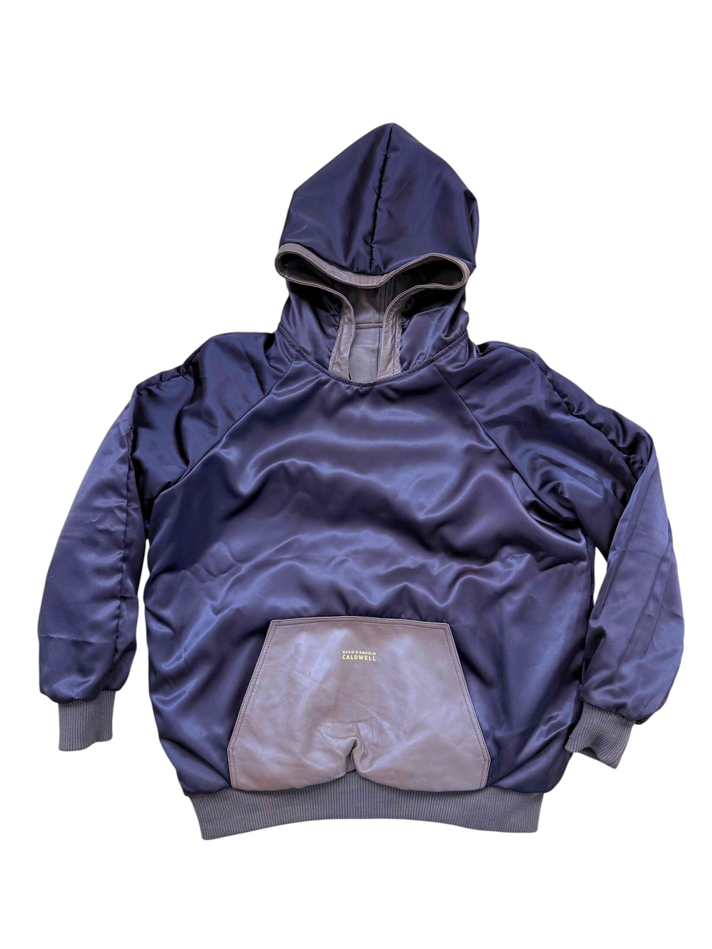 David Dangelo Caldwell reversible hoodie in brown satin with leather pocket detail and oversized hood. Features ribbed cuffs and hem.