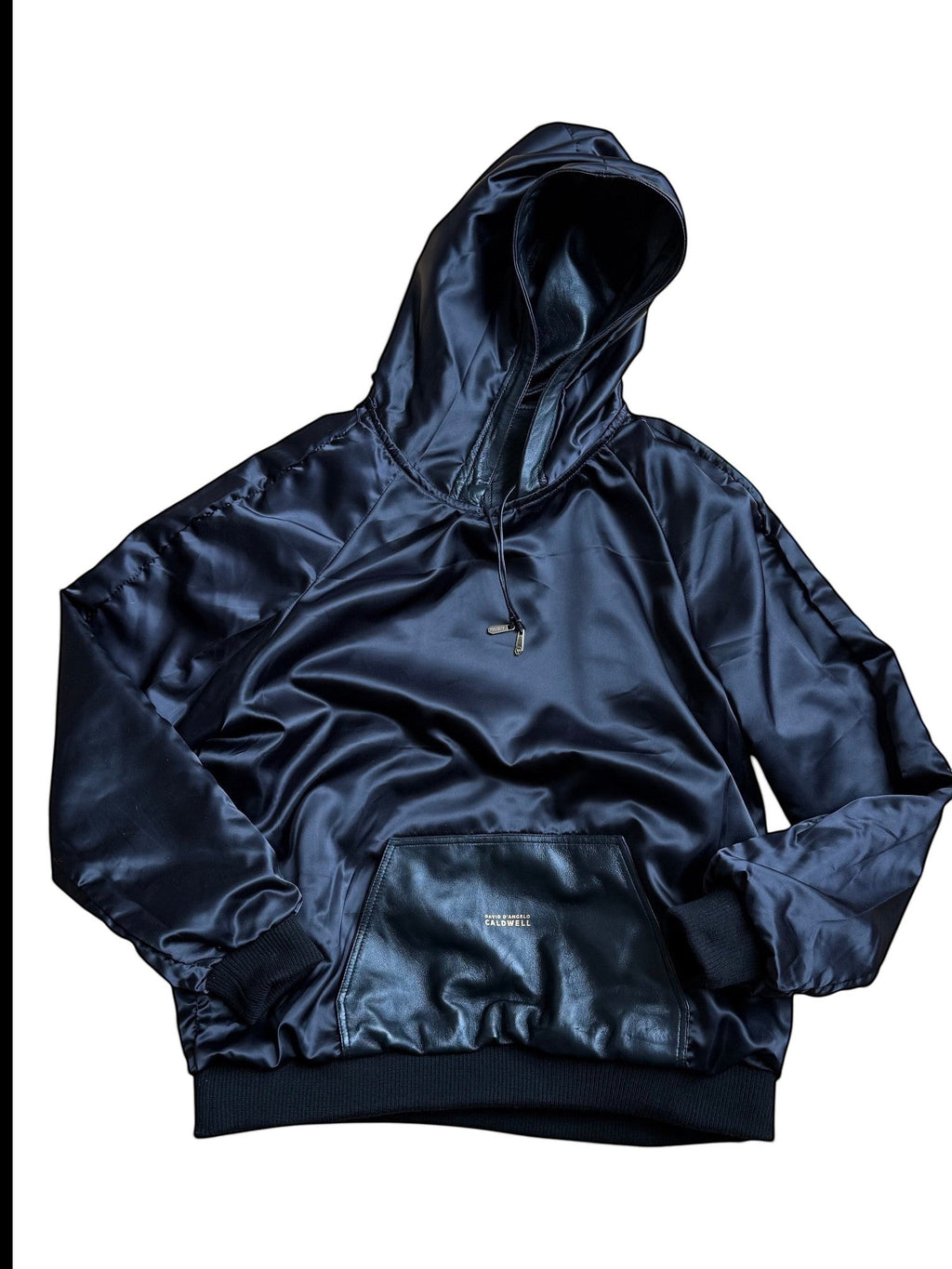 David Dangelo Caldwell black satin reversible hoodie with leather accents and oversized hood.