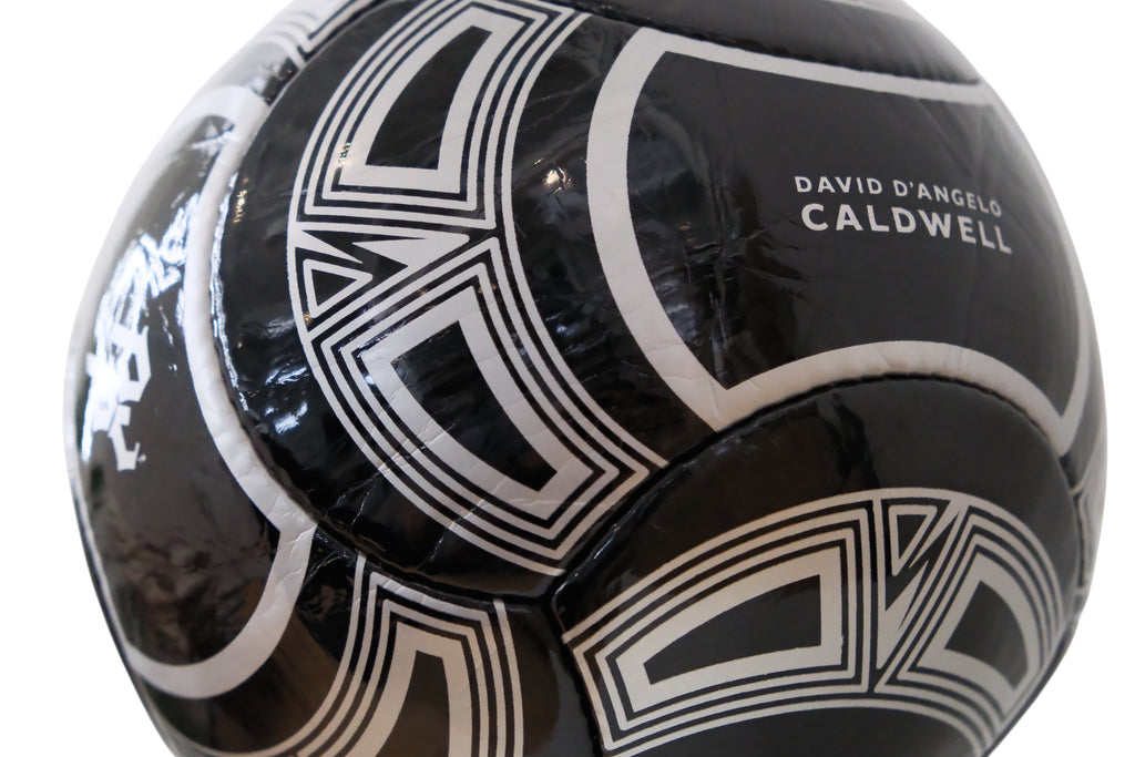 David Dangelo Caldwell black and white PU soccer ball, size 5, official league play with geometric pattern.