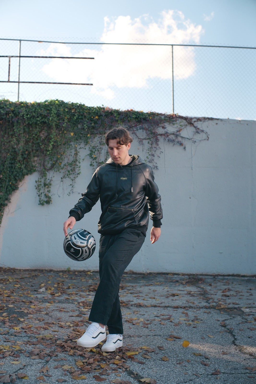 David Dangelo Caldwell official league play size 5 soccer ball, black and white PU material, with custom logo detail.