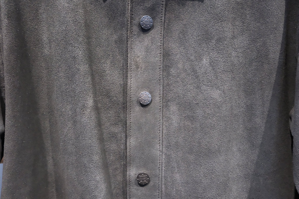 David Dangelo Caldwell dark grey suede jacket with custom hardware buttons and exposed stitching.