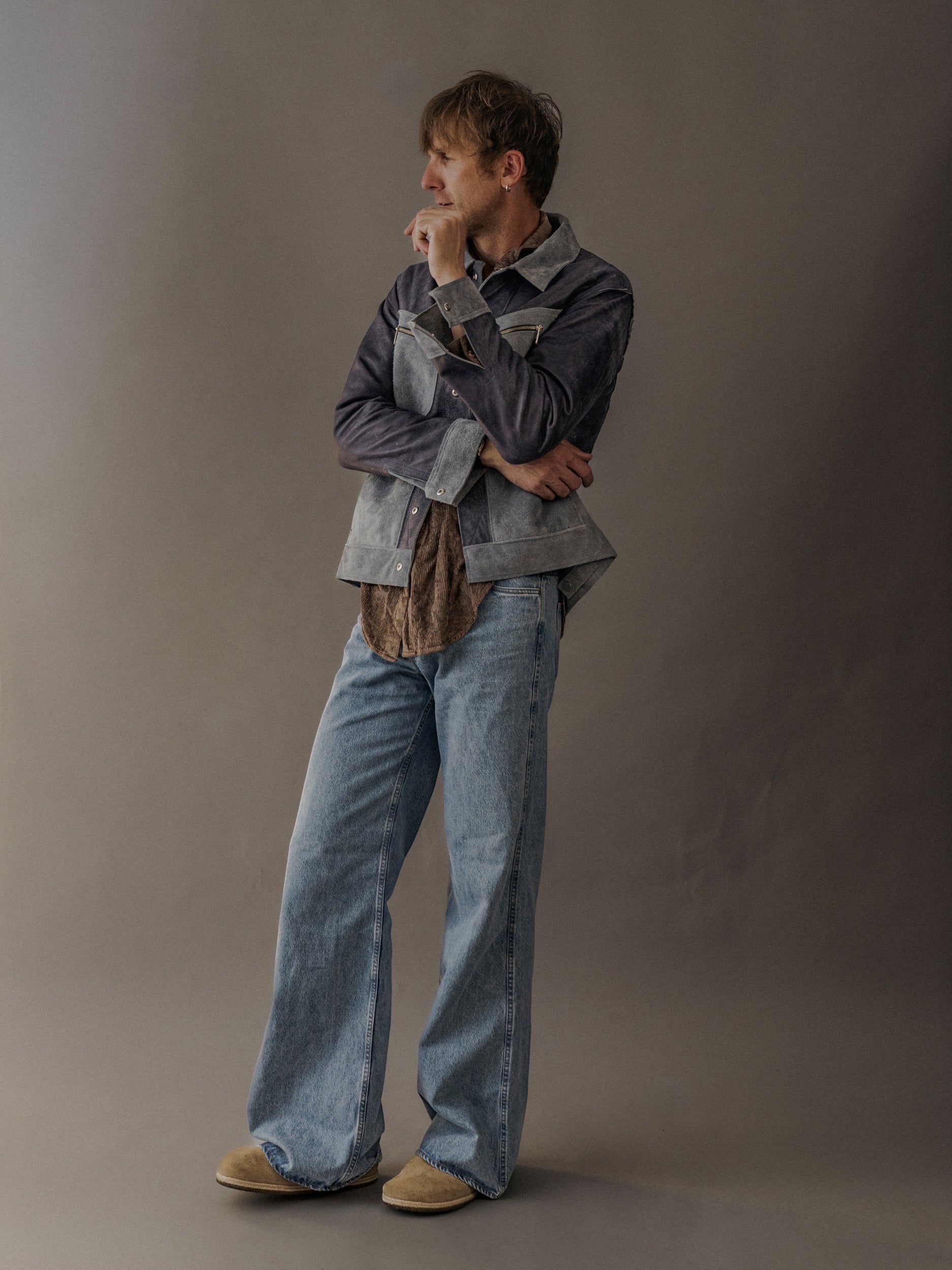 David Dangelo Caldwell reversible trucker jacket in grey suede with exposed seams and proprietary hardware.