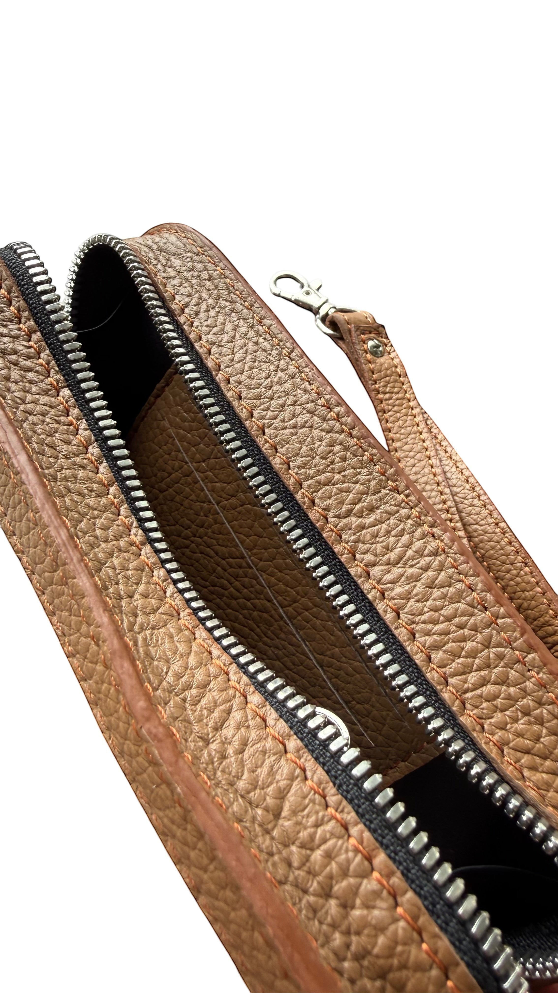 David Dangelo Caldwell tan leather wristlet clutch with zipper closure and detachable wrist strap.