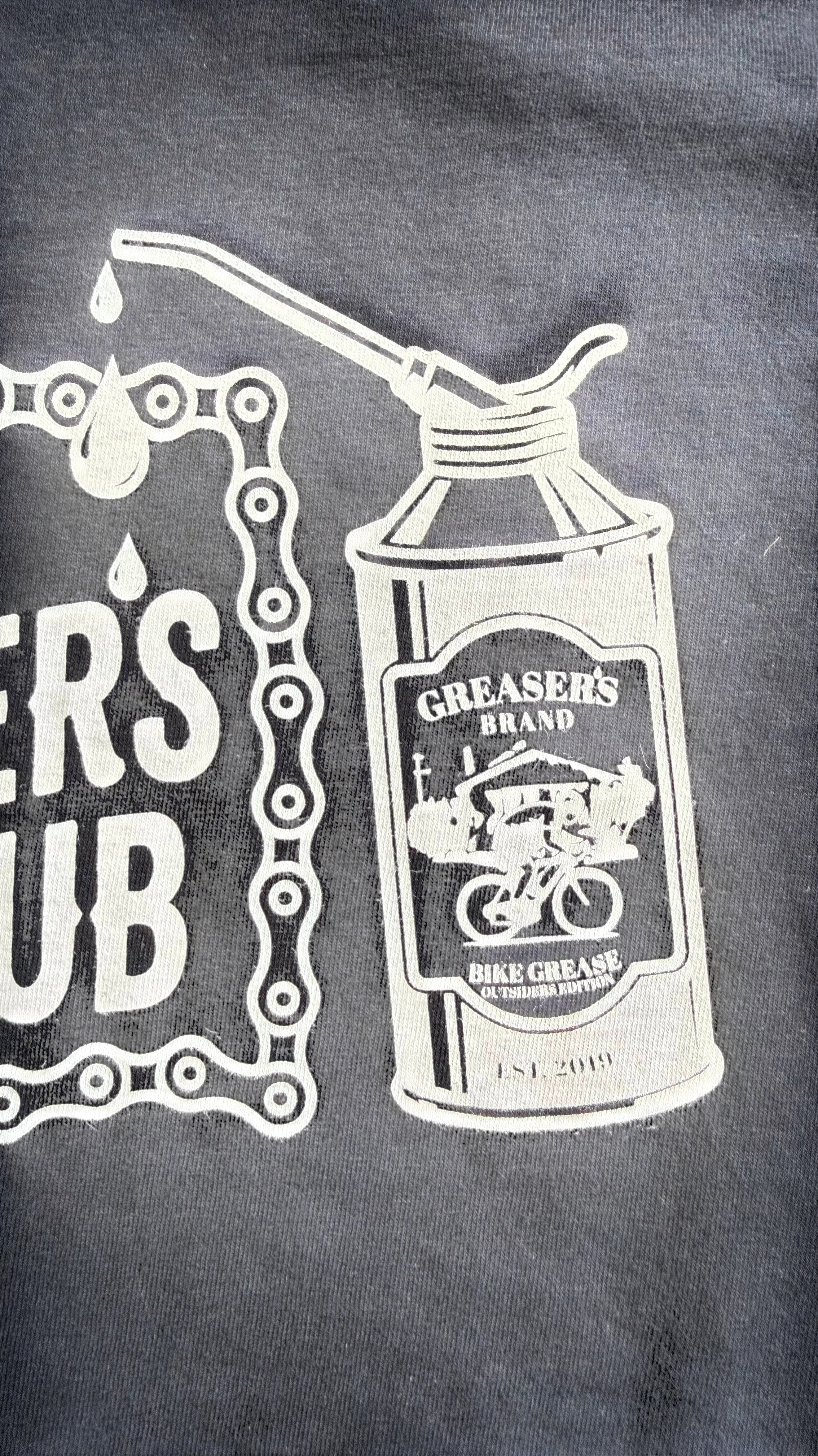 David Dangelo Caldwell Tulsa Greaser's Club 100% cotton t-shirt with bike grease graphic and chain detail.