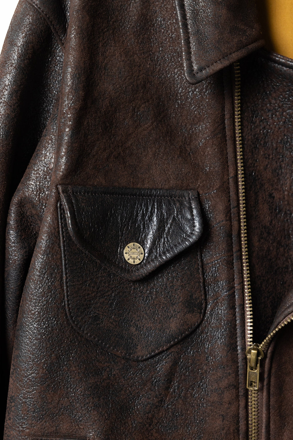 David Dangelo Caldwell chocolate brown Italian lamb leather Wendell jacket with multiple pockets and custom hardware.