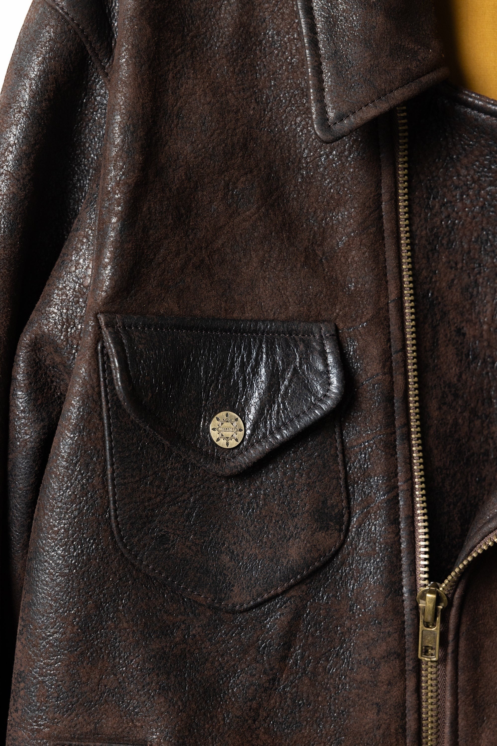 David Dangelo Caldwell chocolate brown Italian lamb leather Wendell jacket with multiple pockets and custom hardware.