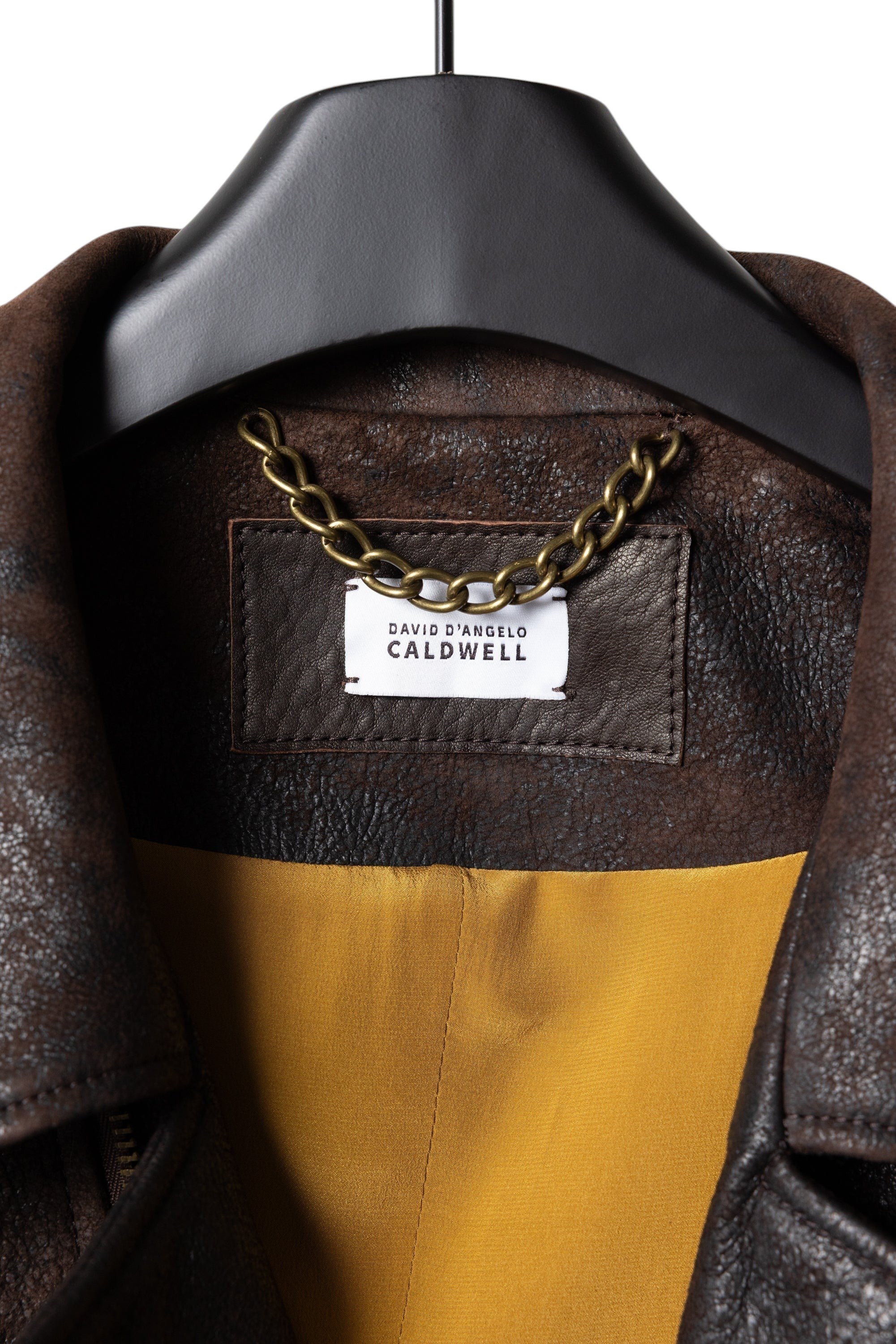 David Dangelo Caldwell chocolate brown Italian lamb leather Wendell jacket with custom hardware and yellow silk lining.