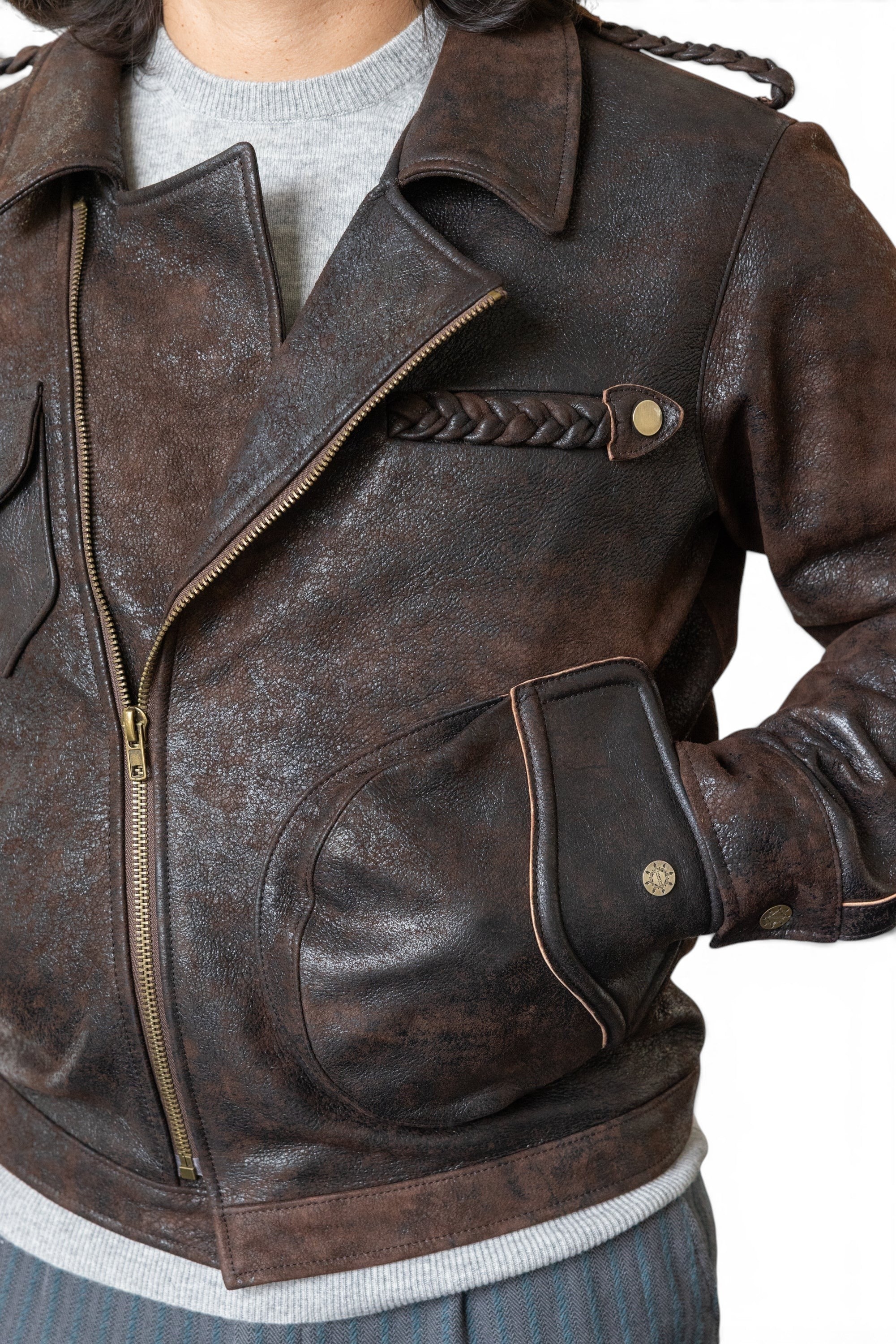 David Dangelo Caldwell Wendell chocolate brown Italian lamb leather jacket with braided details and multiple pockets.